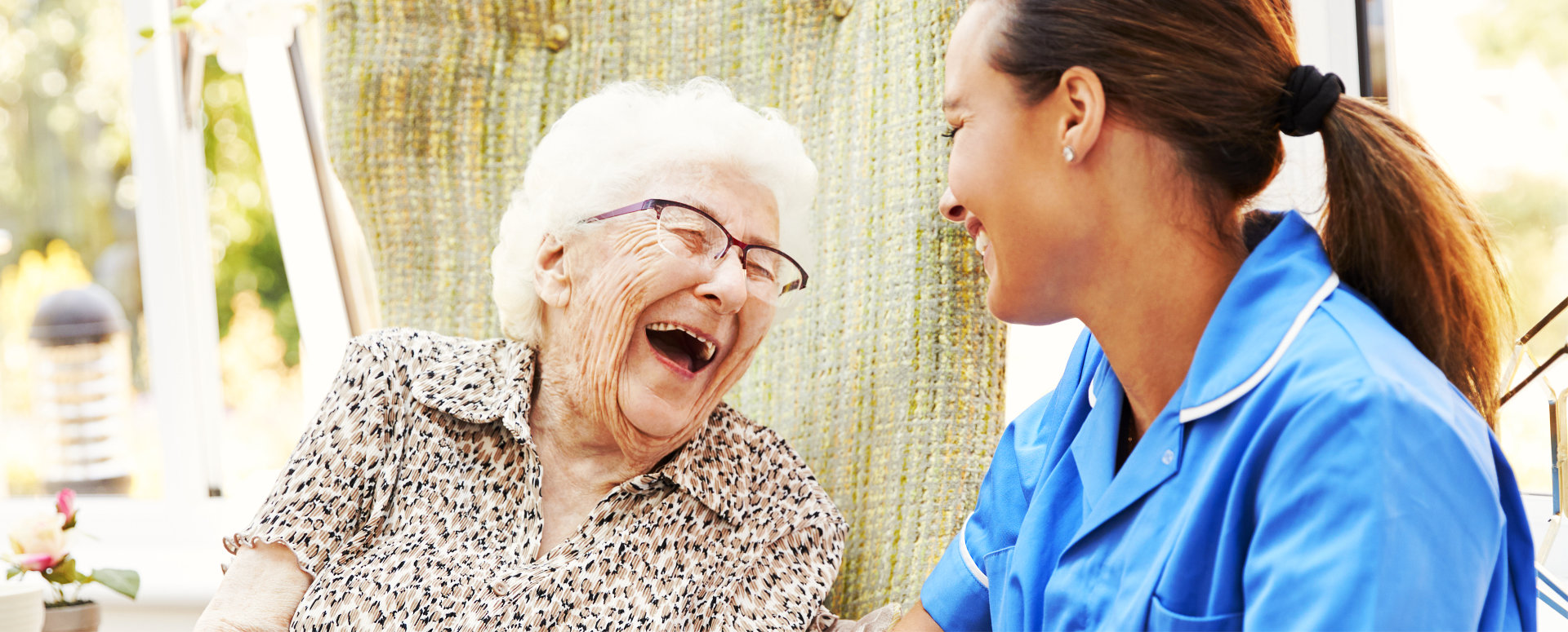 two ladies laughing