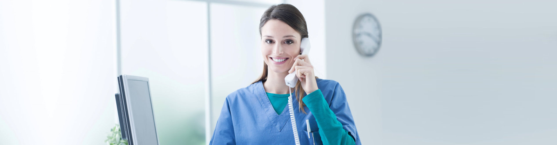 a female caregiver on a telephone